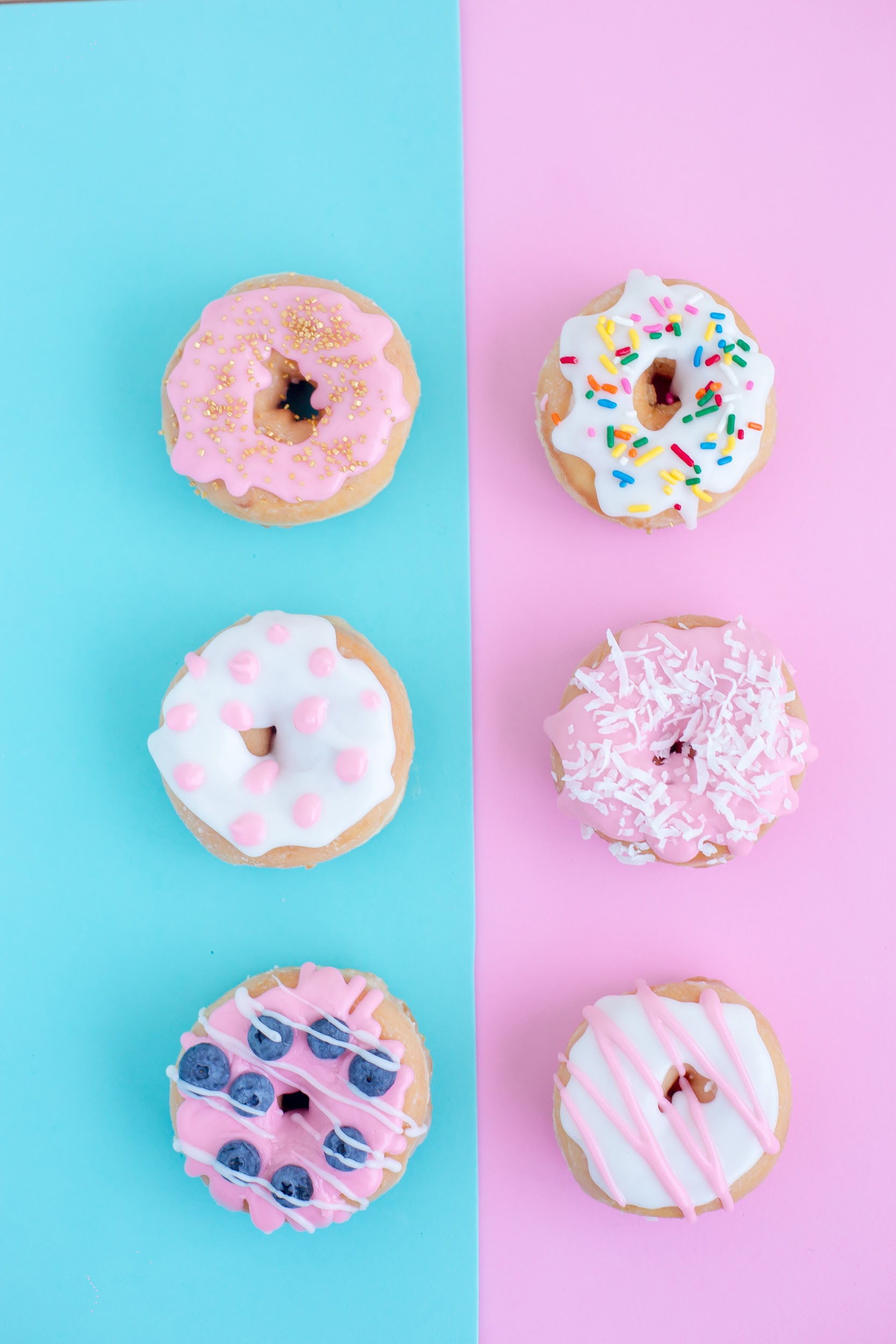 Photo of six assorted-flavor doughnuts.