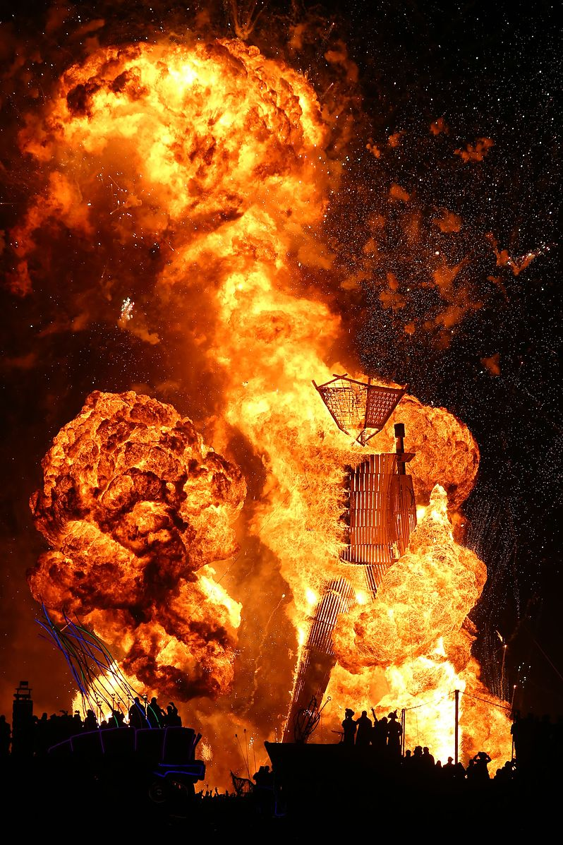 Burning giant wooden effigy at the Burning Man event.