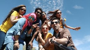 A group of adolescents taking a selfie