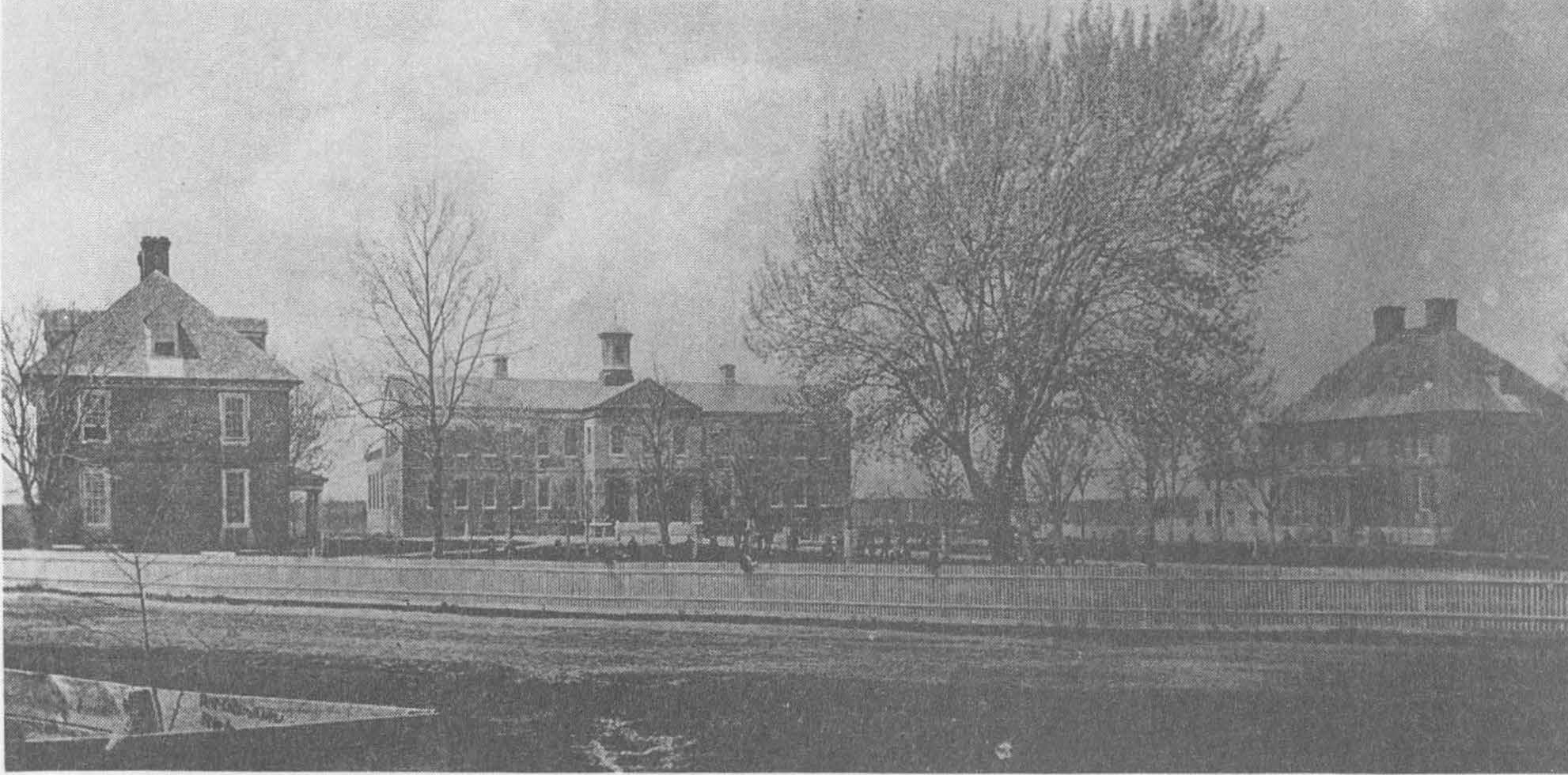 The main building flanked by its two dependencies.
