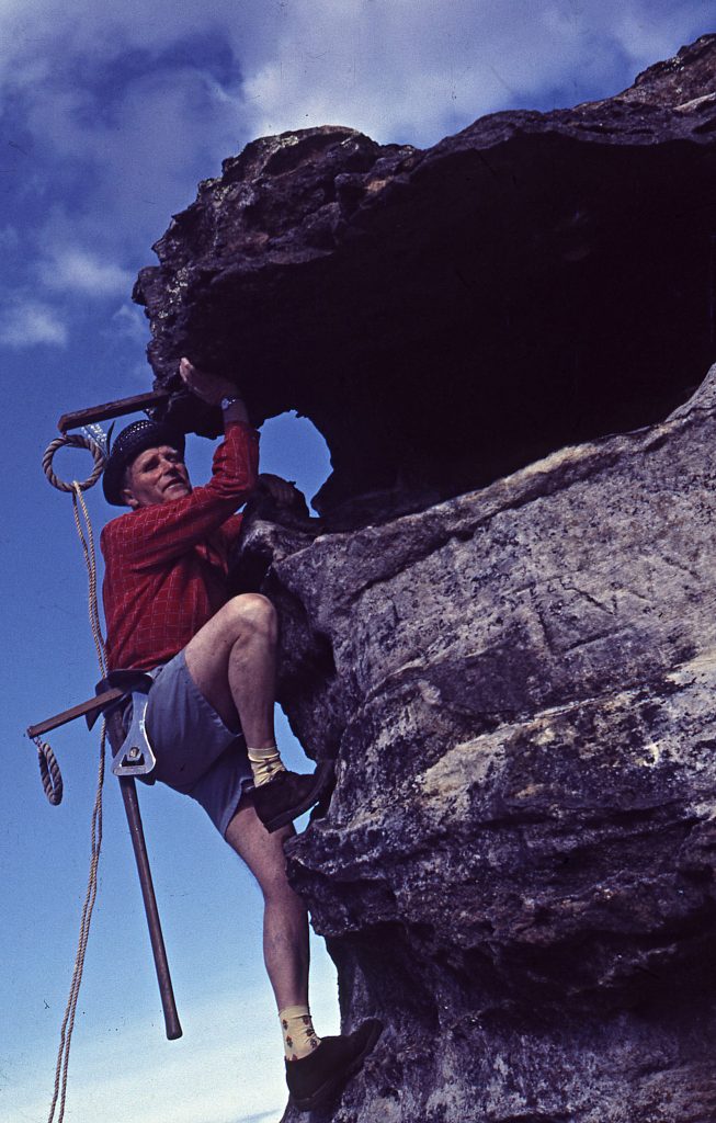 A man climbing a rockface