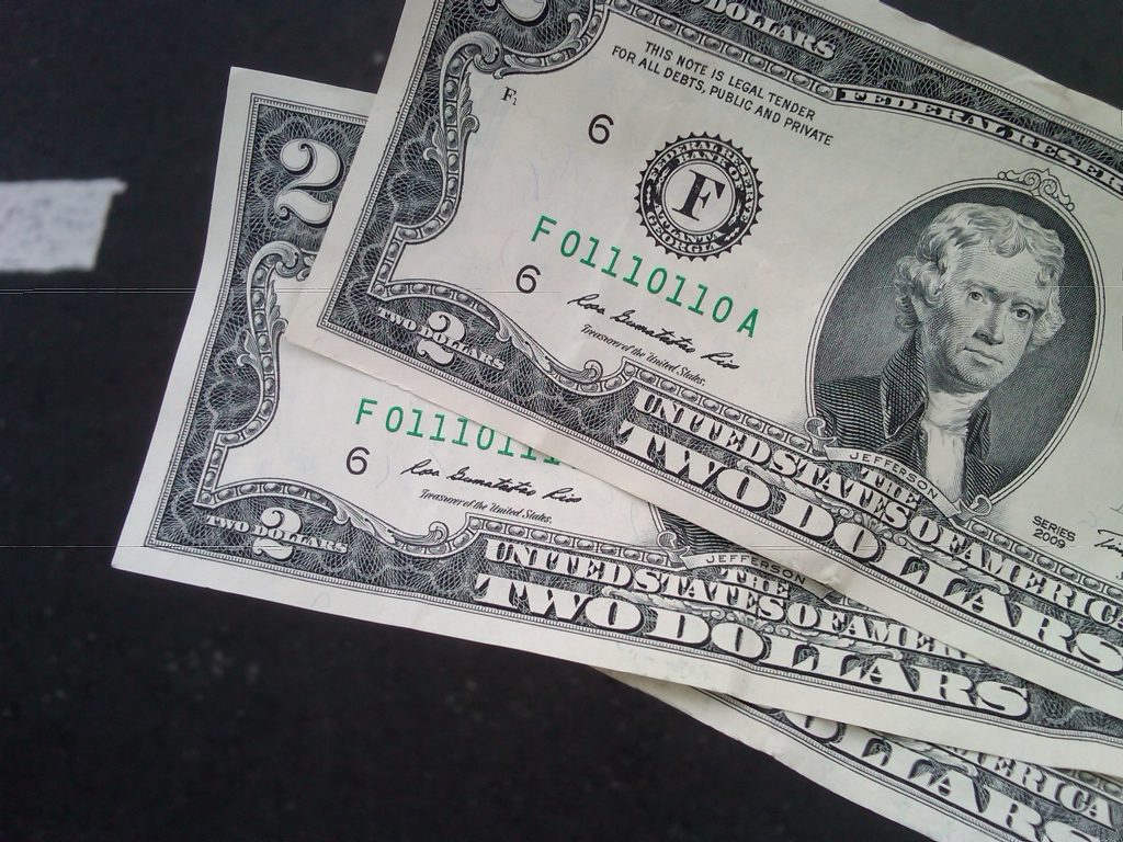 Three two-dollar bills