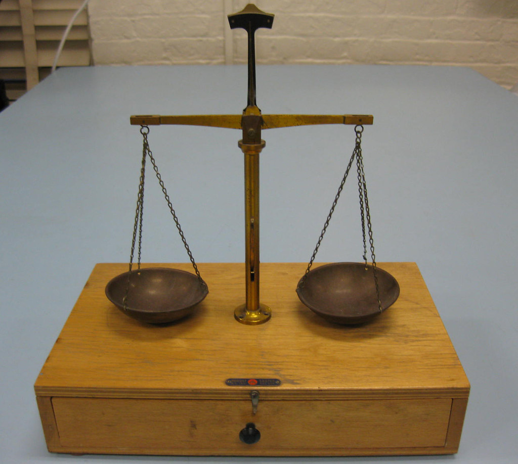 A scale sits on a table.